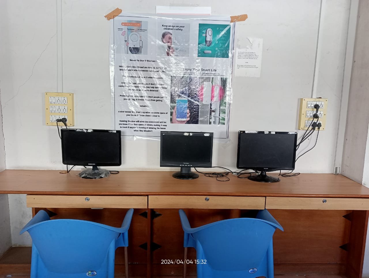 Individual computer workstations with modern monitors and peripherals
